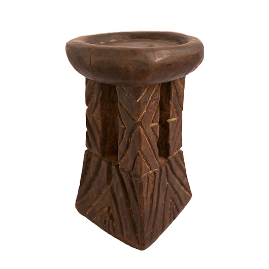 Primitive hand-carved African wooden stool, 20th century