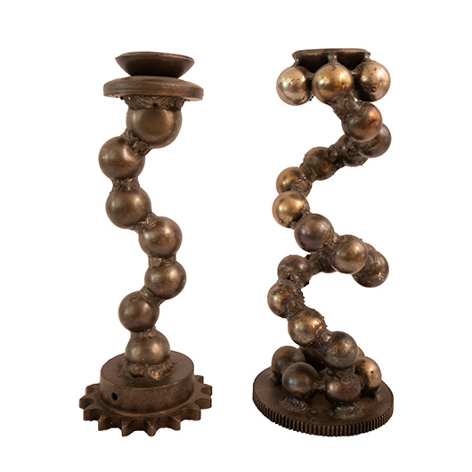 Industrial metal candle holders made from ball bearings and gears sold as a pair